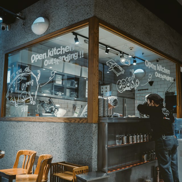 Restaurant interior with an open kitchen